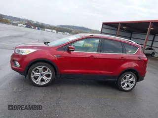 2019 Ford Escape Titanium z VIN 1FMCU9J99KUA18880, wystawiony jako IAAI lot #40830436 z przebiegiem 117 499 mil mil oraz . Historia ofert i sprzedaży dostępna na DreamBid. Obrazek 14.