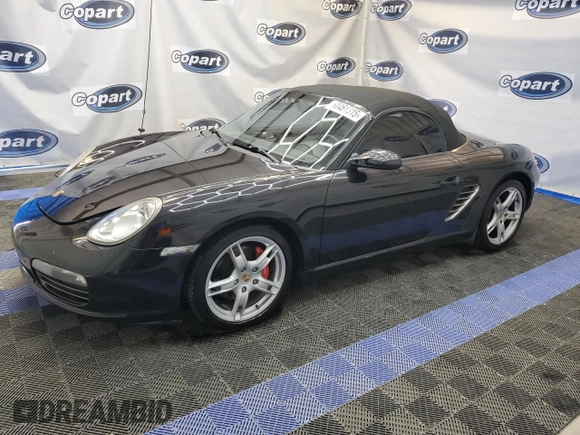 2005 Porsche Boxster S с VIN WP0CB29865S730356, выставлен на аукционе Copart как лот 62115465 с пробегом 102 723 миль миль и Чистый • Clean title. История ставок и продаж доступна на DreamBid. Изображение 1.