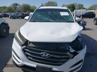 2016 Hyundai Tucson Limited with VIN KM8J33A24GU160815, listed as a IAAI auction lot 41856250 with 98,609 mi miles. Bid and sale history available at carsss.com. Image 12.