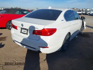 2019 BMW 5 Series 530e with VIN WBAJA9C59KB393045, listed as a IAAI auction lot 40994533 with 64,070 mi miles and . Bid and sale history available at DreamBid. Image 4.