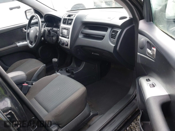 2010 Kia Sportage LX with VIN KNDKGCA33A7706645, listed as a IAAI auction lot 41387232 with 178,714 mi miles and . Bid and sale history available at carsss.com. Image 5.