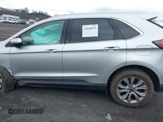 2019 Ford Edge Titanium with VIN 2FMPK4K95KBB55619, listed as a IAAI auction lot 42048941 with 89,999 mi miles. Bid and sale history available at carsss.com. Image 14.