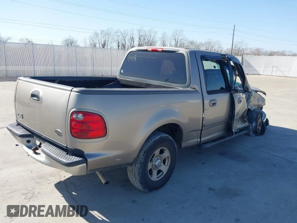 2002 Ford F-150 XLT with VIN 1FTRW07672KB31448, listed as a IAAI auction lot 41226836 with 265,234 mi miles. Bid and sale history available at carsss.com. Image 4.
