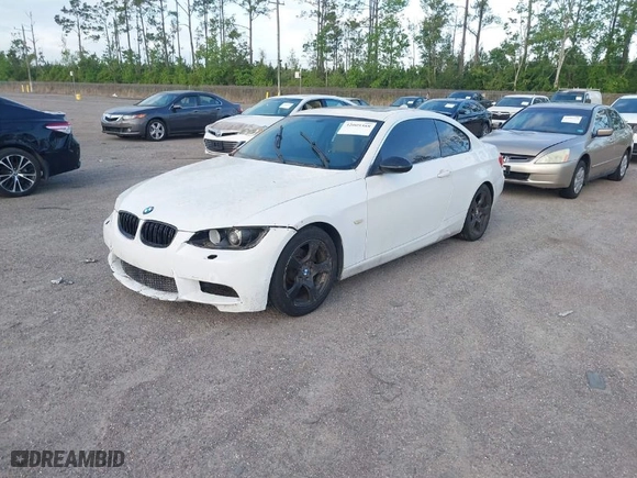 2009 BMW 3 Series 328i with VIN WBAWB33509P137406, listed as a IAAI auction lot 42009388 with 163,648 mi miles. Bid and sale history available at carsss.com. Image 2.