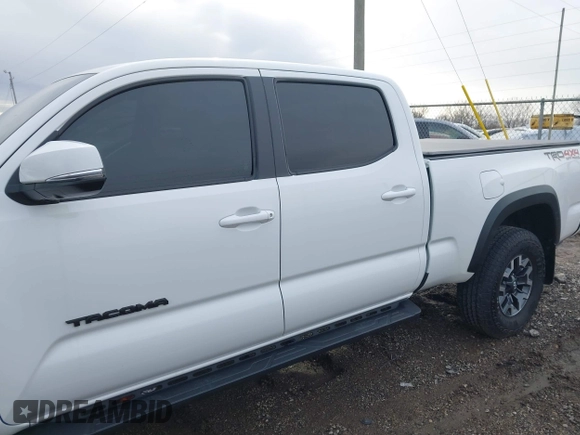 2023 Toyota Tacoma SR5 z VIN 3TMDZ5BN2PM144461, wystawiony jako IAAI lot #41565934 z przebiegiem 75 547 mil mil oraz . Historia ofert i sprzedaży dostępna na DreamBid. Obrazek 14.