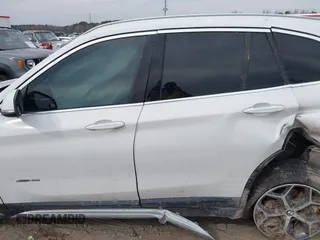 2018 BMW X1 xDrive28i with VIN WBXHT3C31J5K22765, listed as a IAAI auction lot 41800397 with 110,205 mi miles and . Bid and sale history available at DreamBid. Image 14.