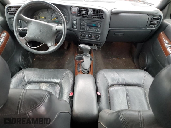 1998 Oldsmobile Bravada z VIN 1GHDT13W9W2730673, wystawiony jako Copart lot #80996524 z przebiegiem 126 418 mil mil oraz Nie do naprawy • Non repairable. Historia ofert i sprzedaży dostępna na DreamBid. Obrazek 8.