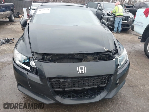 2011 Honda CR-Z with VIN JHMZF1C47BS010539, listed as a IAAI auction lot 41527070 with 166,212 mi miles. Bid and sale history available at carsss.com. Image 6.