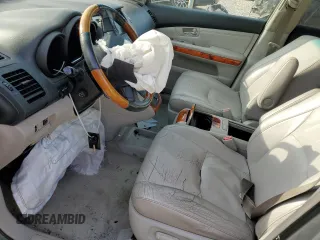 2008 Lexus RX 350 with VIN 2T2GK31U68C028510, listed as a Copart auction lot 52718195 with 215,217 mi miles and Salvage Title. Bid and sale history available at DreamBid. Image 8.