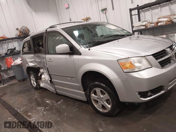 2010 Dodge Grand Caravan SXT with VIN 2D4RN5D15AR261319, listed as a IAAI auction lot 41877022 with 142,292 mi miles and . Bid and sale history available at DreamBid. Image 13.