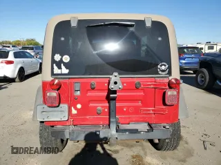 2000 Jeep Wrangler Sport with VIN 1J4FA49S1YP703560, listed as a Copart auction lot 73647844 with 117,300 mi miles and Salvage Title. Bid and sale history available at carsss.com. Image 6.