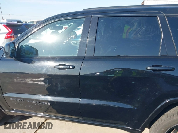 2017 Jeep Grand Cherokee Laredo with VIN 1C4RJFAGXHC817666, listed as a IAAI auction lot 42036817 with 119,698 mi miles. Bid and sale history available at carsss.com. Image 14.