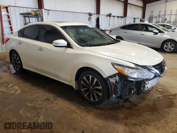 2016 Nissan Altima SR with VIN 1N4AL3AP4GC286765, listed as a Copart auction lot 54713205 with 124,268 mi miles and Salvage Title. Bid and sale history available at DreamBid. Image 4.