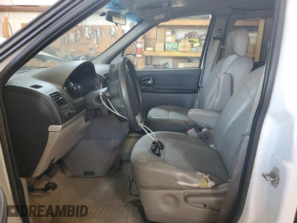 2009 Chevrolet Uplander with VIN 1GNDU33159D114410, listed as a Copart auction lot 77409814 with 247,968 mi miles and Salvage Title. Bid and sale history available at DreamBid. Image 7.