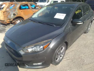 2017 Ford Focus SE with VIN 1FADP3FE3HL295192, listed as a IAAI auction lot 42664709 with 47,589 mi miles and . Bid and sale history available at DreamBid. Image 2.