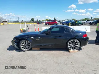 2011 BMW Z4 sDrive35i with VIN WBALM7C58BE383710, listed as a IAAI auction lot 41953452 with 102,510 mi miles. Bid and sale history available at carsss.com. Image 14.