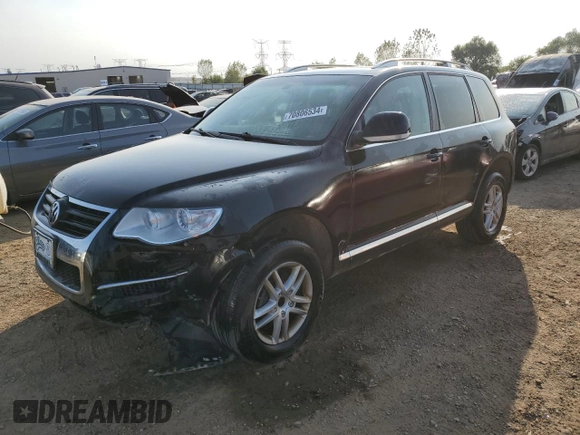 2010 Volkswagen Touareg VR6 with VIN WVGBF7A9XAD001790, listed as a Copart auction lot 70806534 with 90,103 mi miles and Salvage Title. Bid and sale history available at DreamBid. Image 1.