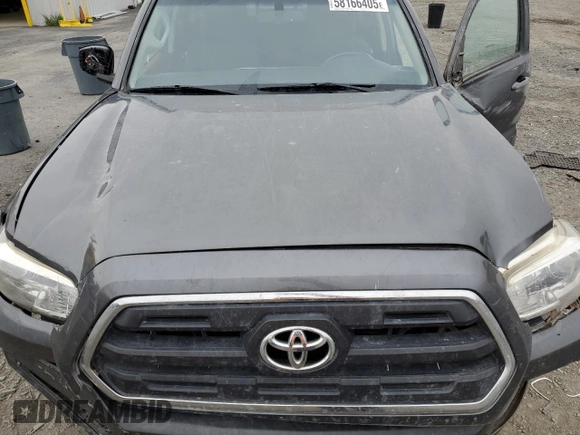 2017 Toyota Tacoma SR5 z VIN 3TMCZ5AN7HM094624, wystawiony jako Copart lot #58166405 z przebiegiem 84 877 mil mil oraz Szkoda całkowita • Salvage title. Historia ofert i sprzedaży dostępna na DreamBid. Obrazek 11.