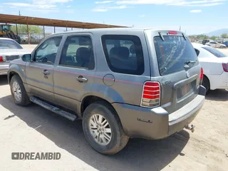 2006 Mercury Mariner Convenience with VIN 4M2YU56ZX6DJ04338, listed as a IAAI auction lot 42564945 with 99,570 mi miles and . Bid and sale history available at DreamBid. Image 3.