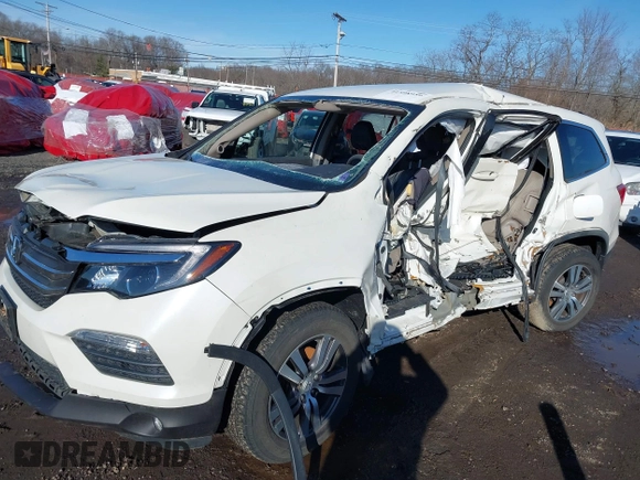 2017 Honda Pilot EX with VIN 5FNYF6H31HB051328, listed as a IAAI auction lot 41598959 with 37,799 mi miles and . Bid and sale history available at DreamBid. Image 6.