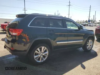 2012 Jeep Grand Cherokee Laredo with VIN 1C4RJFAT8CC307774, listed as a Copart auction lot 48368725 with 84,549 mi miles and Salvage Title. Bid and sale history available at carsss.com. Image 3.