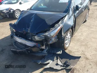 2016 Toyota Prius Two with VIN JTDKBRFU1G3515941, listed as a IAAI auction lot 41053971 with 110,585 mi miles. Bid and sale history available at carsss.com. Image 6.