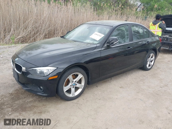 2014 BMW 3 Series 320i xDrive with VIN WBA3C3G5XENS68374, listed as a IAAI auction lot 42042243 with 107,830 mi miles. Bid and sale history available at carsss.com. Image 17.