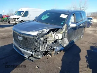 2021 Cadillac Escalade Premium Luxury z VIN 1GYS4CKL2MR231788, wystawiony jako IAAI lot #41630686 z przebiegiem 56 672 mil mil oraz . Historia ofert i sprzedaży dostępna na DreamBid. Obrazek 19.