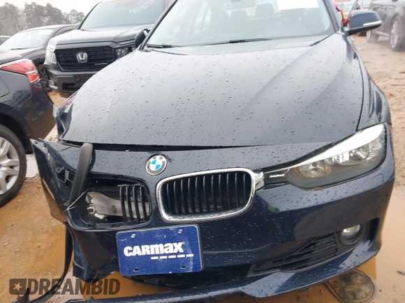 2013 BMW 3 Series 328i xDrive with VIN WBA3B3C54DF536675, listed as a IAAI auction lot 41185325 with 90,296 mi miles and . Bid and sale history available at carsss.com. Image 12.