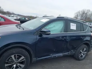 2018 Toyota RAV4 XLE with VIN 2T3RFREV9JW746782, listed as a IAAI auction lot 42065755 with 61,219 mi miles. Bid and sale history available at carsss.com. Image 6.