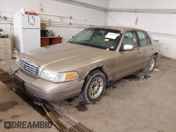 2000 Ford Crown Victoria LX z VIN 2FAFP74W2YX110824, wystawiony jako IAAI lot #42274655 z przebiegiem 93 653 mil mil oraz . Historia ofert i sprzedaży dostępna na DreamBid. Obrazek 2.