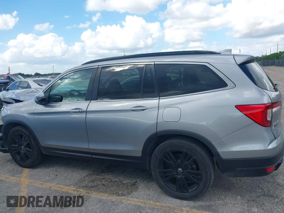 2022 Honda Pilot Special Edition with VIN 5FNYF5H21NB012512, listed as a IAAI auction lot 40677729 with 202,674 mi miles and . Bid and sale history available at carsss.com. Image 14.