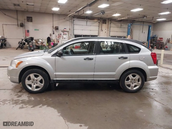 2007 Dodge Caliber SXT with VIN 1B3HB48B07D513778, listed as a IAAI auction lot 41260699 with NaN miles. Bid and sale history available at carsss.com. Image 14.