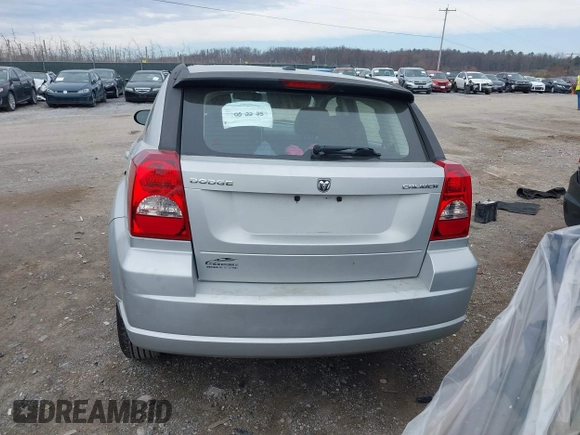 2011 Dodge Caliber Mainstreet with VIN 1B3CB3HA2BD238032, listed as a IAAI auction lot 41865918 with 98,022 mi miles and . Bid and sale history available at DreamBid. Image 16.