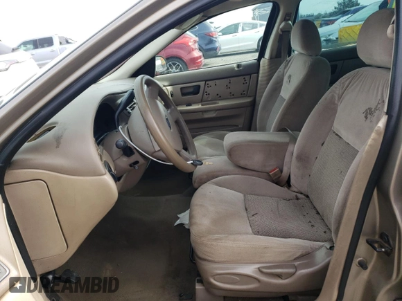 2004 Ford Taurus SE with VIN 1FAFP53U34G129631, listed as a Copart auction lot 45054375 with 182,089 mi miles and Salvage title. Bid and sale history available at DreamBid. Image 7.