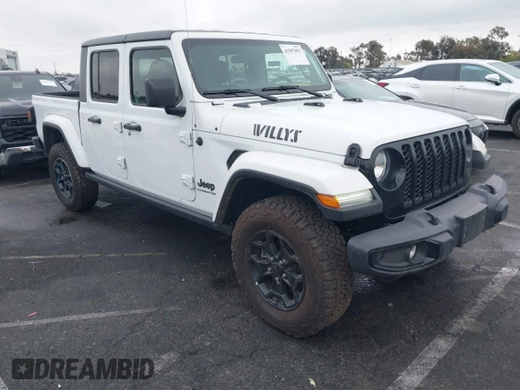 2022 Jeep Gladiator Willys with VIN 1C6HJTAG1NL148524, listed as a IAAI auction lot 41507693 with 42,004 mi miles and . Bid and sale history available at DreamBid. Image 1.