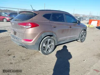 2016 Hyundai Tucson Sport with VIN KM8J33A20GU183234, listed as a IAAI auction lot 41429777 with 113,077 mi miles. Bid and sale history available at carsss.com. Image 4.
