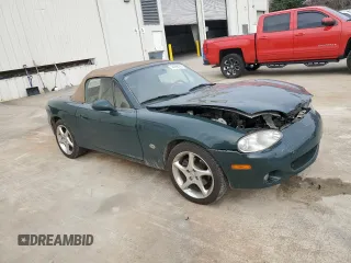 2001 Mazda MX-5 Miata z VIN JM1NB353810212392, wystawiony jako Copart lot #44398295 z przebiegiem 88 601 mil mil oraz Szkoda całkowita • Salvage title. Historia ofert i sprzedaży dostępna na DreamBid. Obrazek 4.
