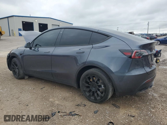 2023 Tesla Model Y Long Range z VIN 7SAYGDEE4PF752292, wystawiony jako Copart lot #53824185 z przebiegiem 61 470 mil mil oraz Szkoda całkowita • Salvage title. Historia ofert i sprzedaży dostępna na DreamBid. Obrazek 2.