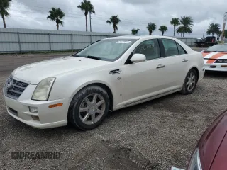 2009 Cadillac STS RWD z VIN 1G6DW67V090162537, wystawiony jako Copart lot #74779844 z przebiegiem Nie podano mil oraz Nie do naprawy • Non repairable. Historia ofert i sprzedaży dostępna na DreamBid. Obrazek 1.