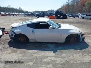 2014 Nissan 370Z with VIN JN1AZ4EH8EM634403, listed as a IAAI auction lot 41923568 with 137,676 mi miles. Bid and sale history available at carsss.com. Image 13.