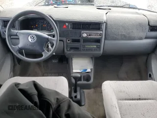 2000 Volkswagen EuroVan с VIN WV2MH4701YH035166, выставлен на аукционе Copart как лот 55680175 с пробегом 220 080 миль миль и Чистый • Clean title. История ставок и продаж доступна на DreamBid. Изображение 8.