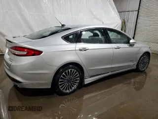 2017 Ford Fusion Hybrid Titanium with VIN 3FA6P0RU7HR383920, listed as a Copart auction lot 56320585 with 20,446 mi miles and Non repairable. Bid and sale history available at DreamBid. Image 3.