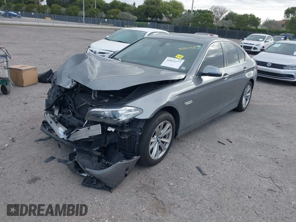 2015 BMW 5 Series 528i with VIN WBA5A5C52FD514549, listed as a IAAI auction lot 41812177 with 107,819 mi miles. Bid and sale history available at carsss.com. Image 2.