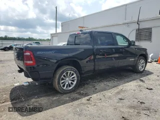 2023 Ram 1500 Laramie with VIN 1C6SRFRT1PN577199, listed as a Copart auction lot 64833895 with 22,119 mi miles and Salvage title. Bid and sale history available at DreamBid. Image 3.