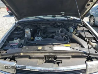 1999 Chevrolet Blazer Trailblazer z VIN 1GNDT13W1X2169254, wystawiony jako Copart lot #55021105 z przebiegiem 158 169 mil mil oraz Szkody całkowita. Historia ofert i sprzedaży dostępna na DreamBid. Obrazek 12.