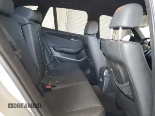 2014 BMW X1 sDrive28i z VIN WBAVM1C57EVW50653, wystawiony jako Copart lot #57309385 z przebiegiem Nie podano mil oraz Szkoda całkowita • Salvage title. Historia ofert i sprzedaży dostępna na DreamBid. Obrazek 11.