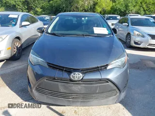 2018 Toyota Corolla L z VIN 2T1BURHE3JC058810, wystawiony jako IAAI lot #42236449 z przebiegiem 126 557 mil mil oraz . Historia ofert i sprzedaży dostępna na DreamBid. Obrazek 6.