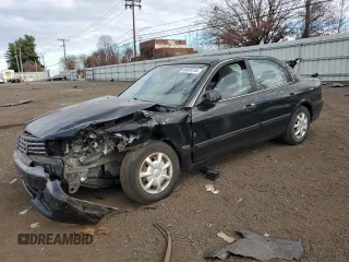 2001 Kia Optima LX z VIN KNAGD126315028712, wystawiony jako Copart lot #85302564 z przebiegiem 81 722 mil mil oraz Nie do naprawy • Non repairable. Historia ofert i sprzedaży dostępna na DreamBid. Obrazek 1.
