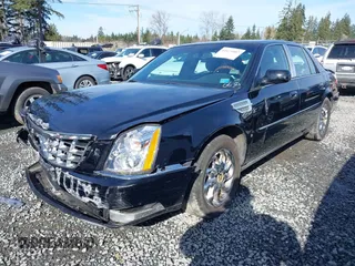 2006 Cadillac DTS 1SC z VIN 1G6KD57YX6U100634, wystawiony jako IAAI lot #41671007 z przebiegiem Nie podano mil oraz . Historia ofert i sprzedaży dostępna na DreamBid. Obrazek 17.